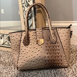 Elegant Textured Handbag with Gold Accents